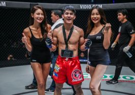 Danny Kingad with ring girls