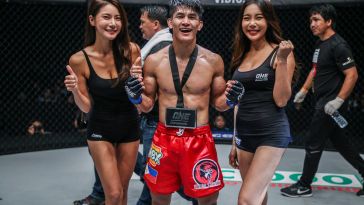 Danny Kingad with ring girls